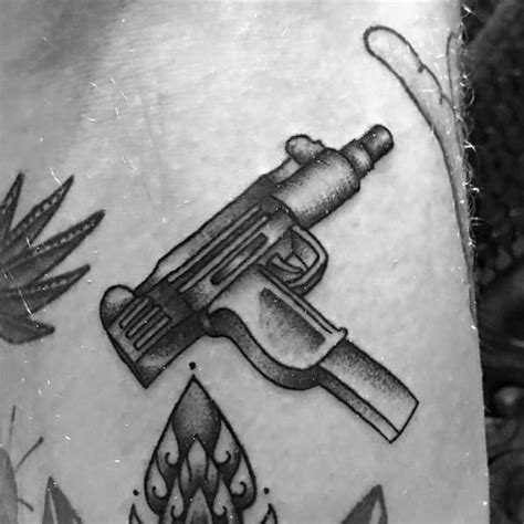 50 Uzi Tattoo Ideas For Men - Firearm Designs