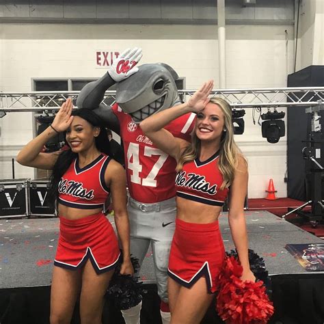 Ole Miss Cheerleaders with the new Land Shark mascot | Ole miss, Ole miss football, Hot cheerleaders
