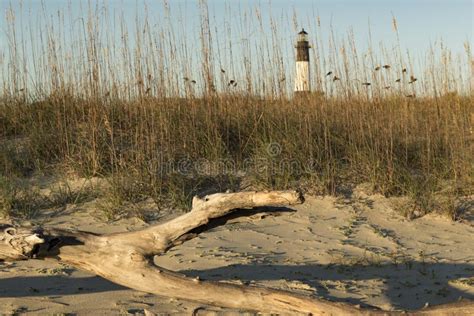 Lighthouse Beach Scene on Ocean Shore Beautiful Landscape Scene Stock Photo - Image of ...