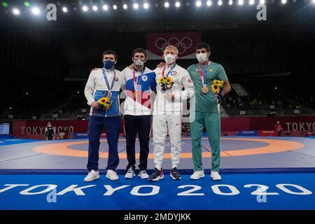 Medalists, from left to right, Belarus' Mahamedkhabib Kadzimahamedau ...