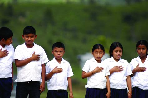 HONDURAS: Children in School Uniform with Hands to Their H… | Flickr