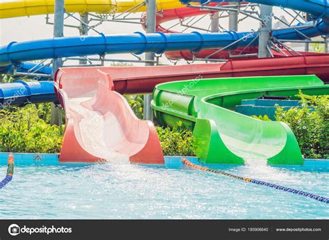 Colorful water slides at the water park — Stock Photo © galitskaya #185906640