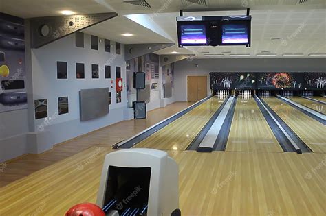 Premium Photo | Bowling alley with lanes.