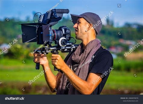 Cameraman Holding Camera Baliindonesia Stock Photo 2082879070 | Shutterstock