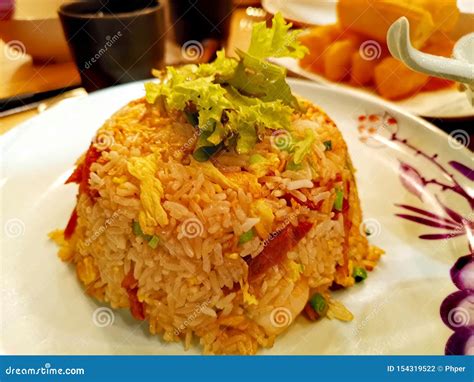 Fried rice on a plate stock photo. Image of chinese - 154319522