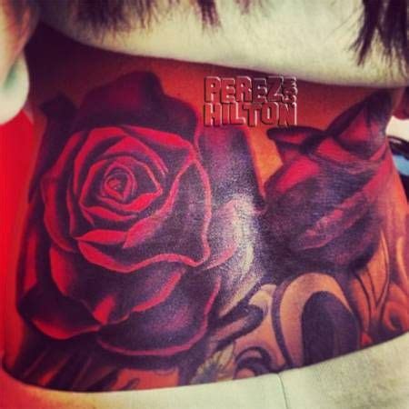 Cheryl Cole Gets MASSIVE Rose Back Tattoo | Rose tattoo on back, Lower back tattoos, Rose tattoos