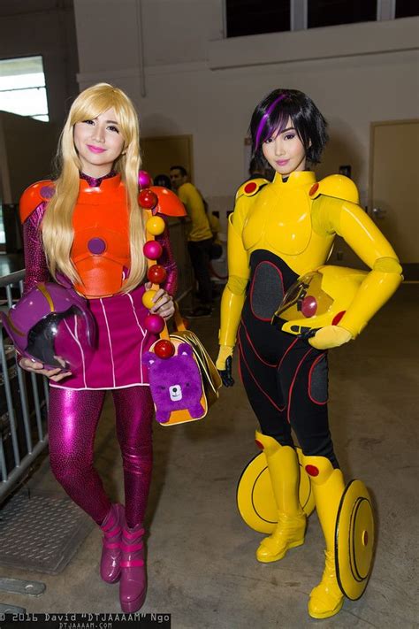 two women in costumes standing next to each other