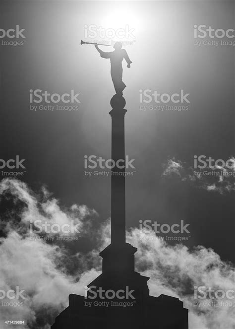 Silhouetted Moroni On Lds Temple Stock Photo - Download Image Now - Mormonism, Gold - Metal ...