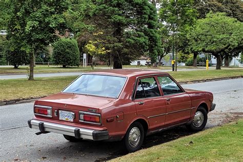 Old Parked Cars Vancouver: 1979 Datsun 210 Sedan