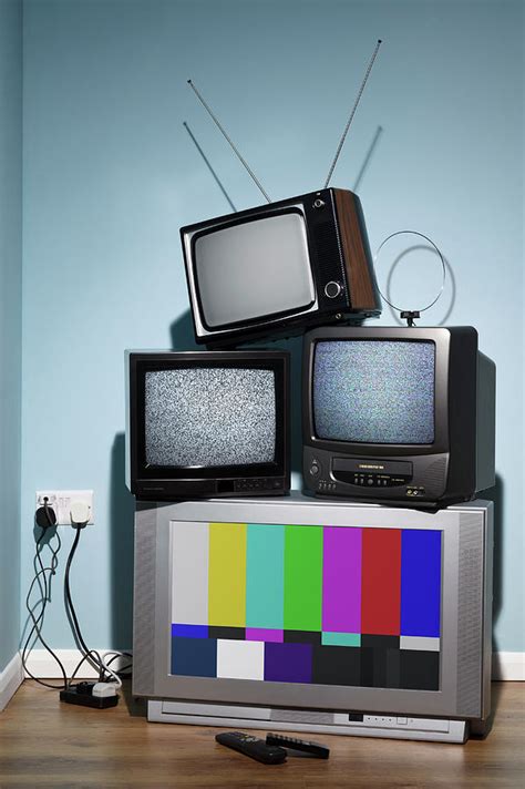 Old Televisions In The Corner Of A Room by Rtimages