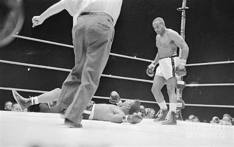 Sonny Liston Watches Floyd Patterson Photograph by Bettmann - Fine Art ...