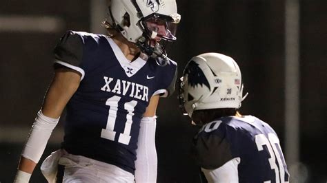 Xavier high school football team advances to WIAA state quarterfinals