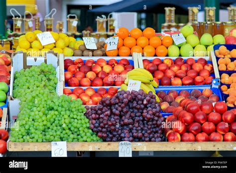 Fresh fruits and vegetables at farmers market stall Stock Photo - Alamy