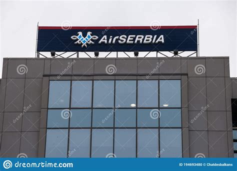 Logo of Air Serbia, on Their Main Office at Dusk. Air Serbia, Partly Belonging To Etihad, is ...