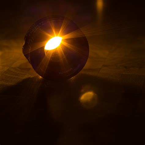 camera lens with lens flare | a tea candle behind a camera l… | Flickr