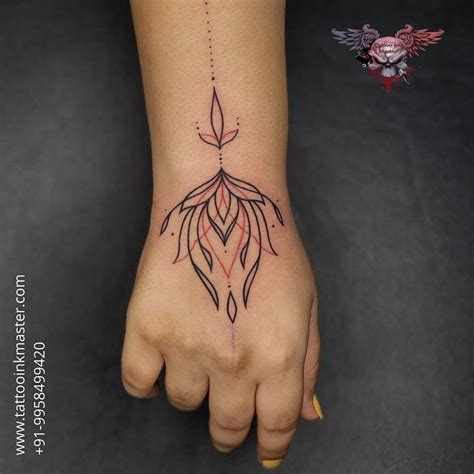 Beautiful Black and Red Lotus Tattoo On Arm | Tattoo Ink Master