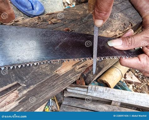 How To Sharpen a Hand Saw Easily Stock Photo - Image of vehicle, wheel: 228097436