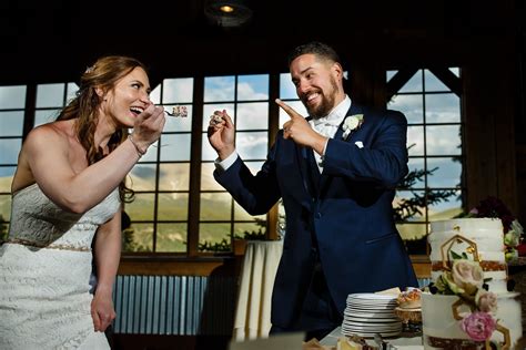 Sharon and Nick enjoy their wedding cake - Justin Edmonds Photography