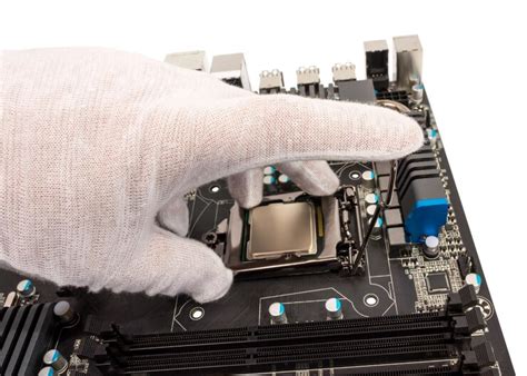 Premium Photo | Installation of modern processor in cpu socket on the motherboard