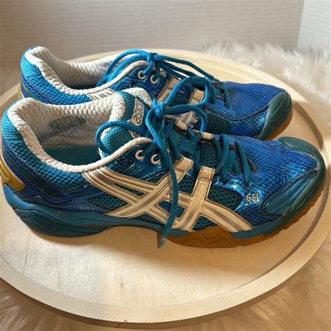 ASICS gel running sneakers size 9.5 metallic blue... - Depop