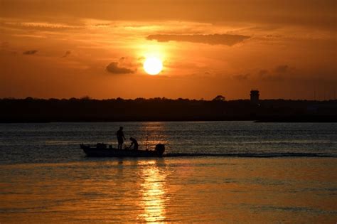 Boat At Sunset Over The River Free Stock Photo - Public Domain Pictures