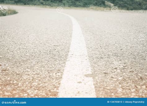 Asphalt Road with White Solid Line. Stock Image - Image of winding ...