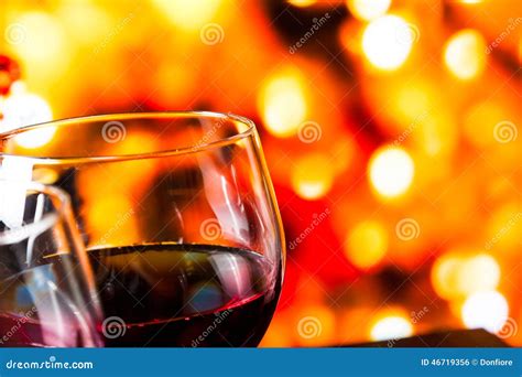 Red Wine Glasses Against Colorful Unfocused Lights Background Stock ...