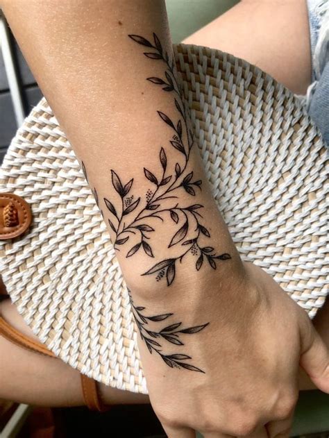 Pin by Taylor Heck on Tattoos | Wrap around wrist tattoos, Around wrist ...