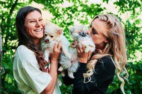 Footballers with animals on Twitter: "Ramona Bachmann and Alisha Lehmann cuddling dogs https://t ...