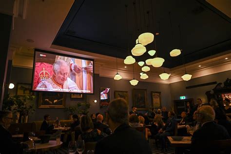 People watch the Coronation of King Charles III in Sydney – Middle East ...