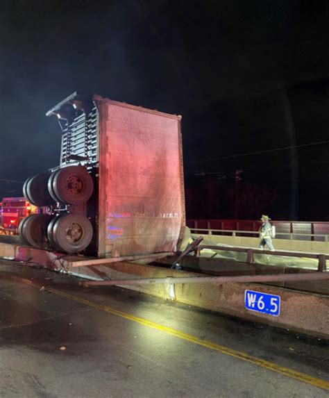 PHOTOS: Semi-truck crashes off bridge and catches fire in Hammond | WGN-TV