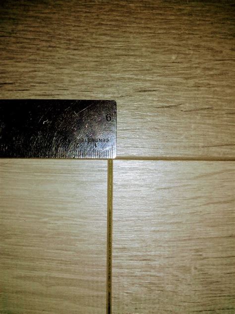 Best way to deal with gaps between laminate floor panels ...