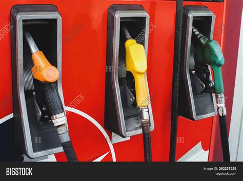 Gas Pump Nozzles Gas Image & Photo (Free Trial) | Bigstock