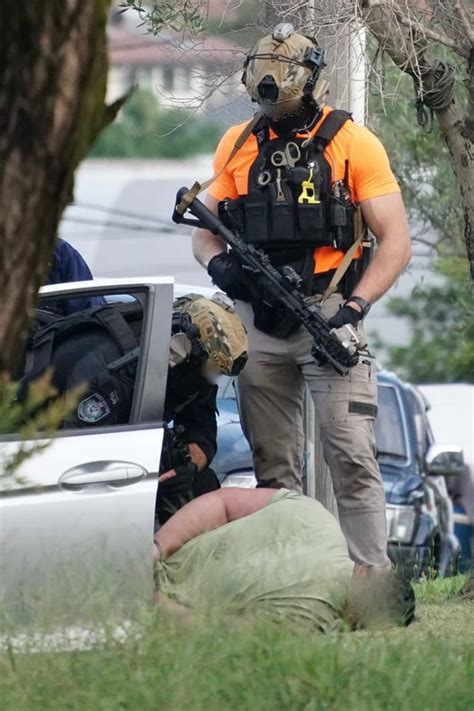 Members of the New South Wales Police Force Tactical Operations Unit conducting an arrest (1365 ...