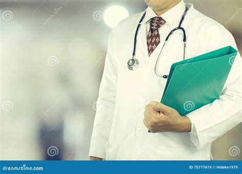 Male Doctor Working with Stethoscope Stock Image - Image of health, meds: 75777619