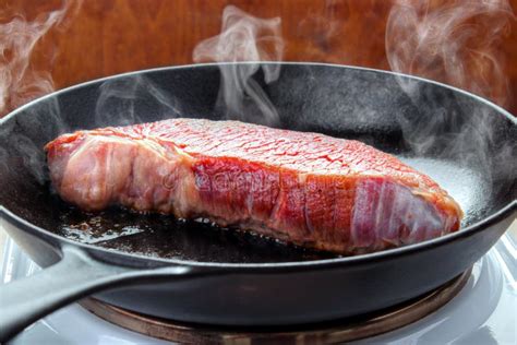 Pan frying beef brisket stock photo. Image of cook, food - 114385310