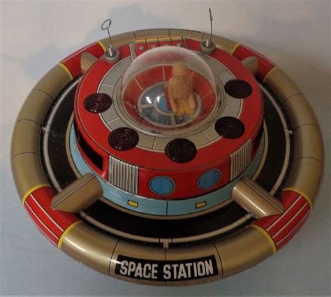 Space Station battery operated tin toy by TN of Japan. Measures 9" in ...