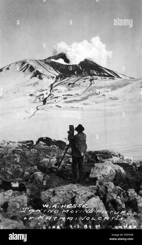 ALASKA: KATMAI VOLCANO. /nW.A. Hesse filming a Katmai Volcano eruption ...