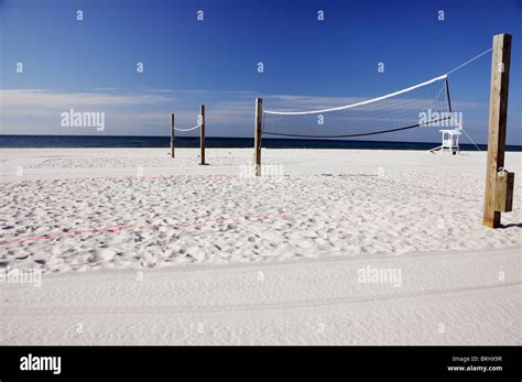 Beach volleyball nets on white sand beach Stock Photo - Alamy