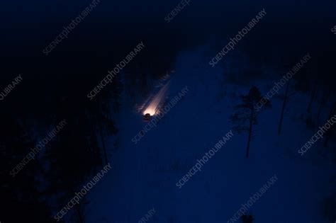 Aerial view of a car driving at night, Liikva, Estonia - Stock Image ...