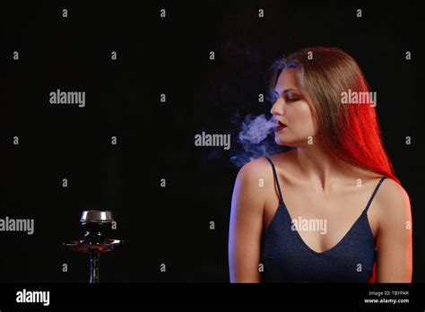 Woman smoking hookah hi-res stock photography and images - Alamy