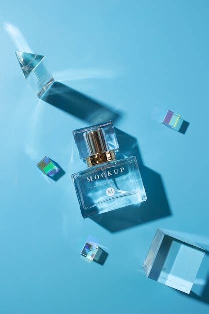 Premium PSD | Top view perfume bottle on blue background