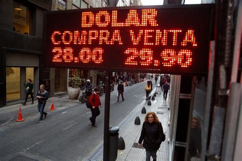 Argentine Peso Slides Despite World's Highest Interest Rates, IMF ...