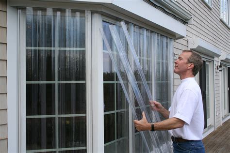 Installing VuSafe Storm Panels over Bay Windows. These hurricane ...