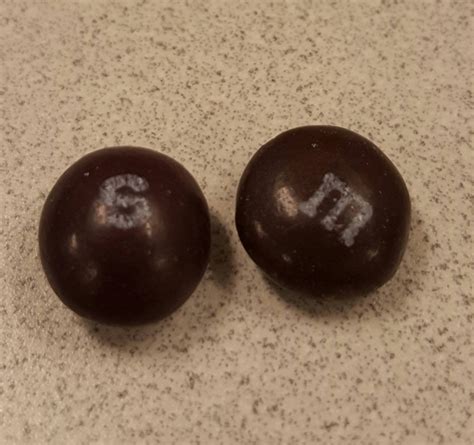 A brown M&M and purple Skittle are almost indistinguishable from one another : mildlyinteresting