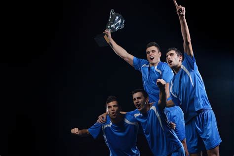 soccer players celebrating victory 11631651 Stock Photo at Vecteezy