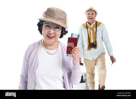 Happy travel elderly couple Stock Photo - Alamy