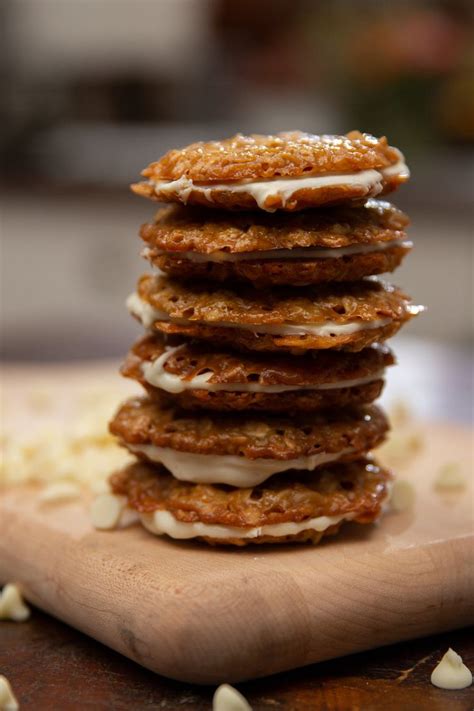 a stack of food sitting on top of a wooden cutting board