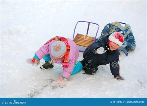 Two kids with sleds stock photo. Image of person, sledge - 7617802