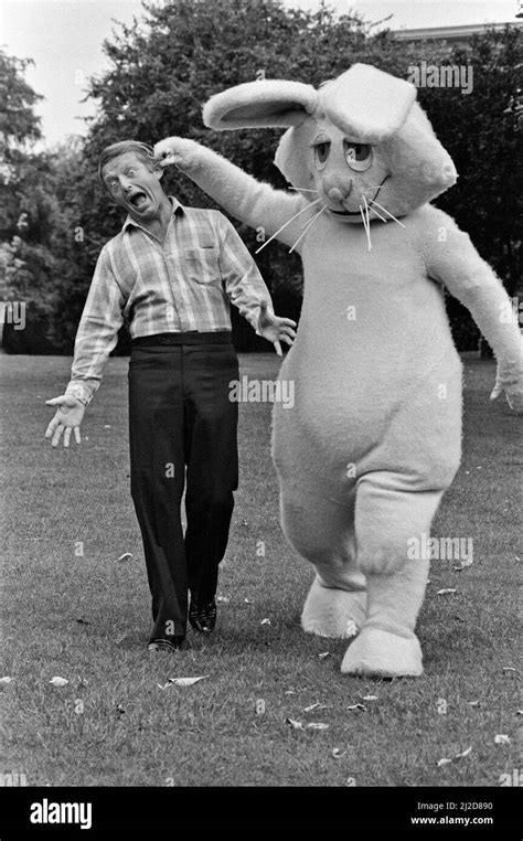 Magician Paul Daniels with his co-stars in the Children's BBC programme 'Wizbit'. He is pictured ...